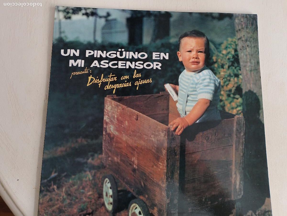 Discos de vinilo: Un Ping&uuml;ino En Mi Ascensor &ndash; Disfrutar Con Las Desgracias Ajenas,con el encarte,1989