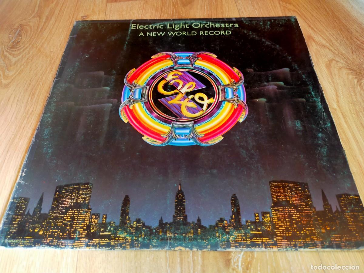 Discos de vinilo: ELECTRIC LIGHT ORCHESTRA-A NEW WORLD RECORD-CONTIENE ENCARTE-ORIGINAL ESPA&Ntilde;OL 1976