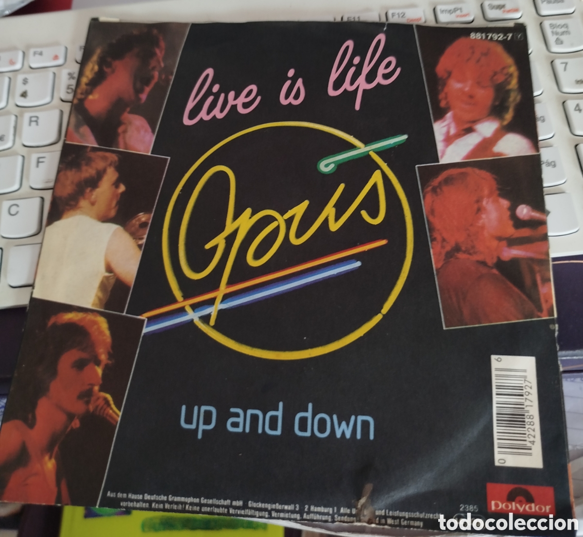 Discos de vinilo: Opus &ndash; Live Is Life.