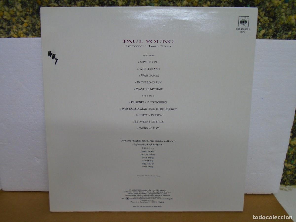 Discos de vinilo: PAUL YOUNG&rdquo;BETWEEN TWO FIRES&rdquo; VINILO CBS 1986. - Foto 2