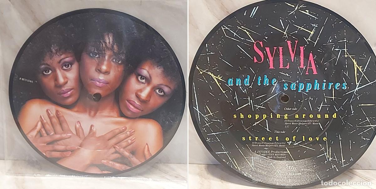 Discos de vinilo: SYLVIA AND THE SAPPHIRES | SHOPPING AROUND | PICTURE DISC 7&rdquo; | UK 1982 | STIFF PBUY 154
