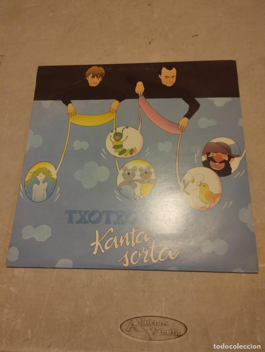 Discos de vinilo: TXOTXONGILLO LP KANTA SORTA INSERT LETRAS