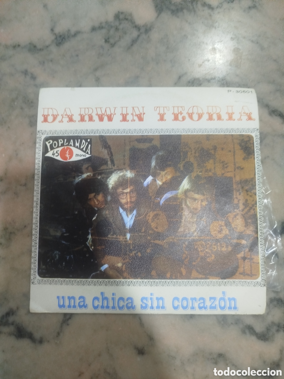Discos de vinilo: Darwin Teor&iacute;a - Una chica sin coraz&oacute;n