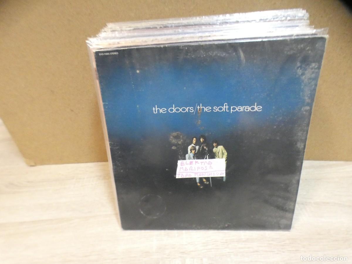 Vinyl records: ARKANSAS1980 LOTT779 VINILO LEVE USO AUN CORRECTO - THE DOORS ELEKTRA MARIPOSA TAPA MANCHADA