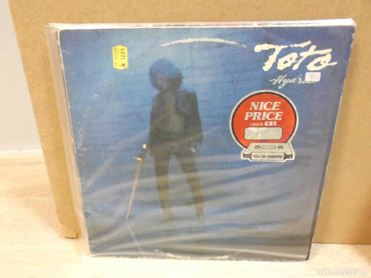 Discos de vinilo: ARKANSAS1980 CAJJ788 VINILO LEVE USO AUN CORRECTO - TOTO