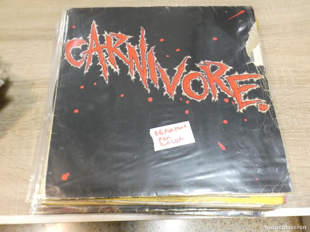 Discos de vinilo: ARKANSAS1980 CAJJ788 VINILO DESTROZADO A TU RIESGO - CARNIVORE DEFORMADO POR CALOR