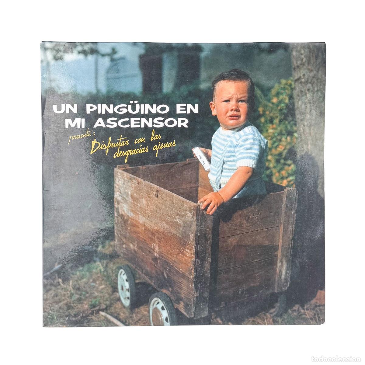 Discos de vinilo: LP. Un Ping&uuml;ino En Mi Ascensor. Disfrutar Con Las Desgracias Ajenas (G+/VG+)