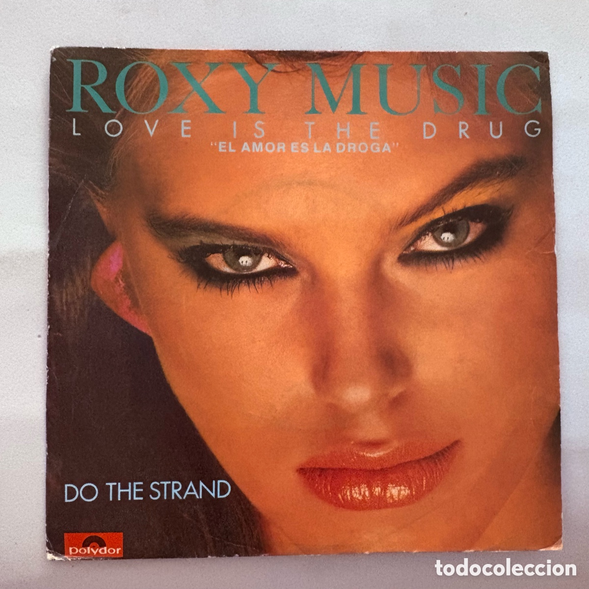Discos de vinilo: single 7'' Roxy Music &lrm;&ndash; Love Is The Drug / Do The Strand edicion espa&ntilde;ola de 1984
