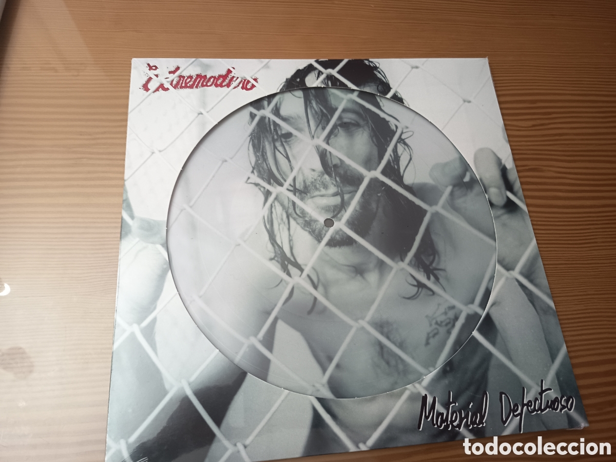 Discos de vinilo: Precintado !! Vinilo en formato picture disc del &aacute;lbum Material Defectuoso de Extremoduro.