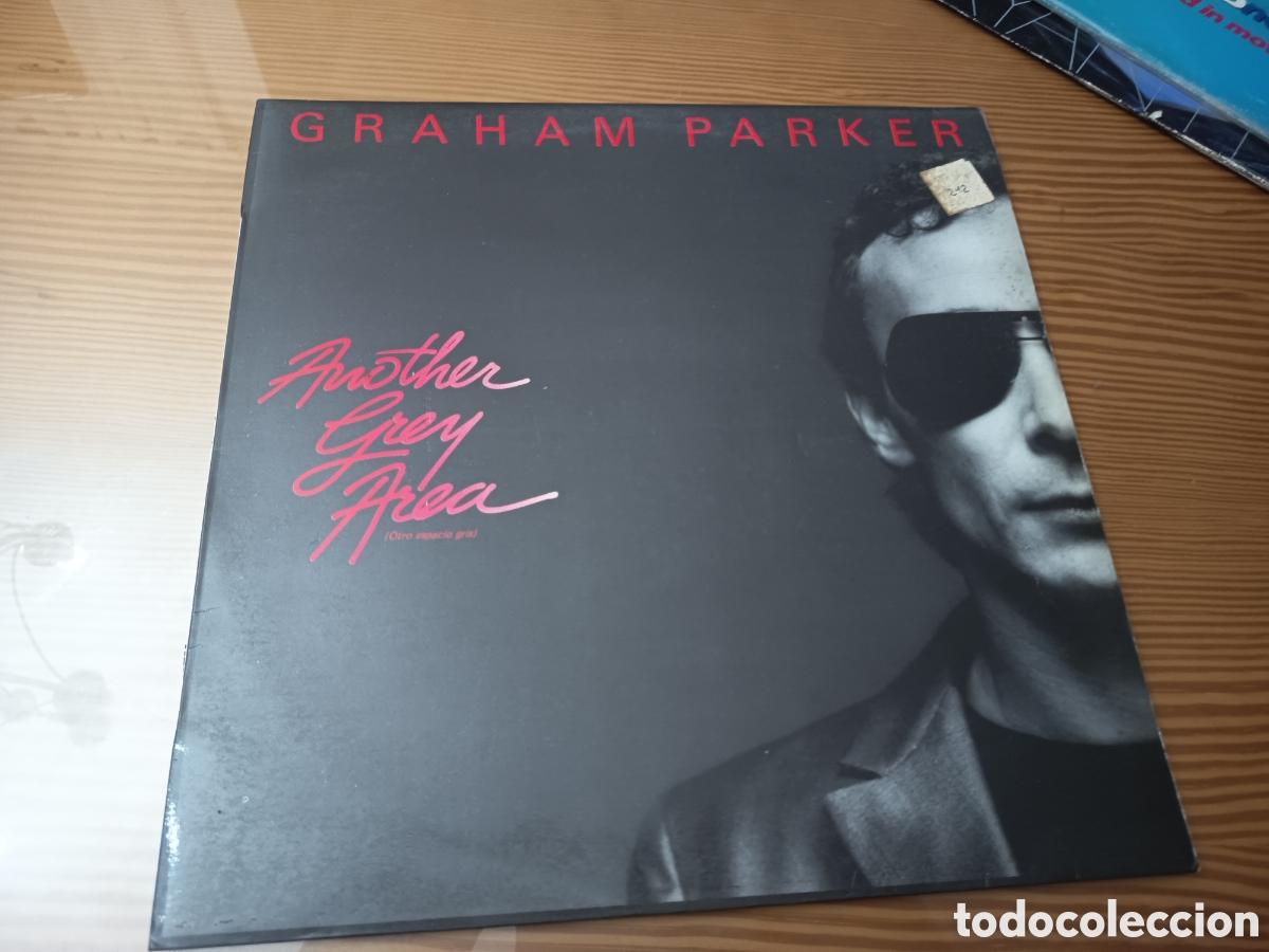 Discos de vinilo: Vinilo LP del &aacute;lbum Another Grey Area de Graham Parker. Edici&oacute;n espa&ntilde;ola de 1982