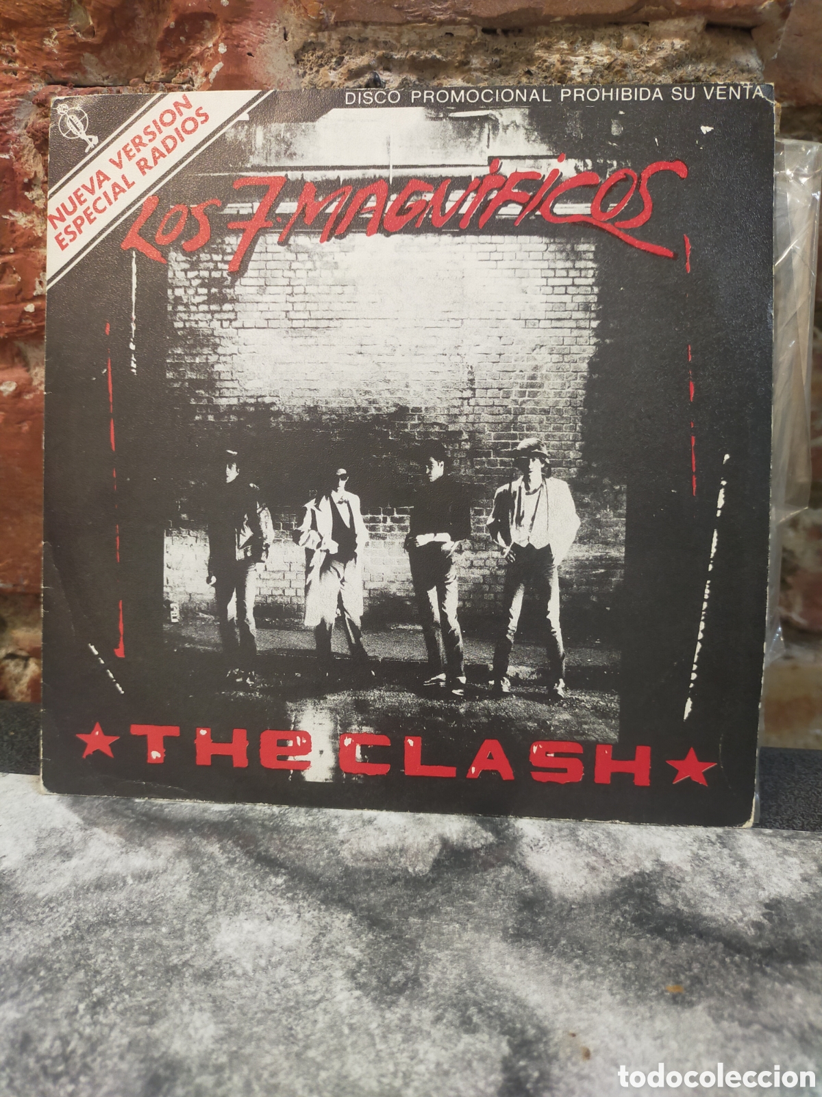 Discos de vinilo: single promocional de 7&rdquo; de The Clash &ndash; Los 7 Magn&iacute;ficos