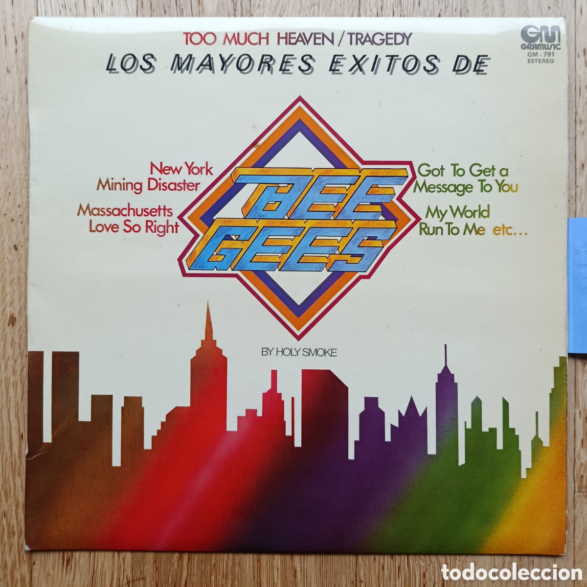 Discos de vinilo: Los mayores &eacute;xitos de Bee Gees. Holy Smoke. Vinyl - LP