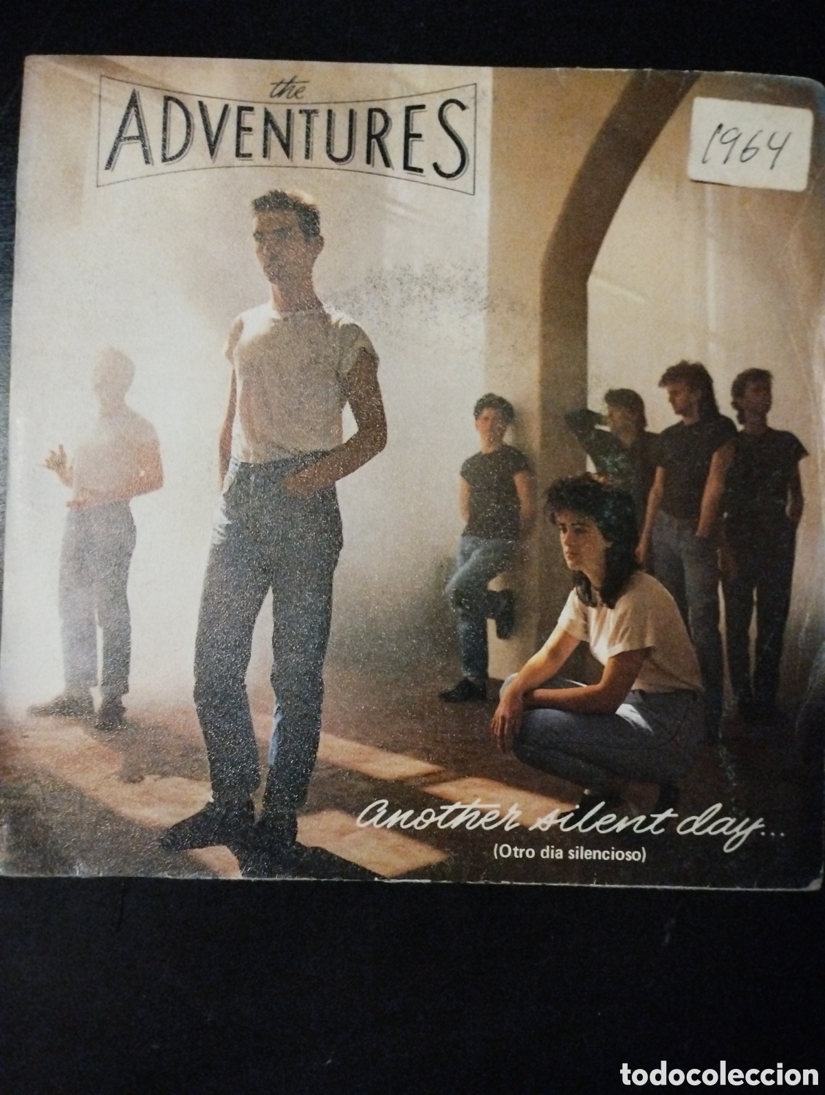 Discos de vinilo: The Adventures &ndash; Another Silent Day... = Otro D&iacute;a Silencioso. 1984. Espa&ntilde;a. Vinilo, 7&rdquo;, 45 RPM, Sing
