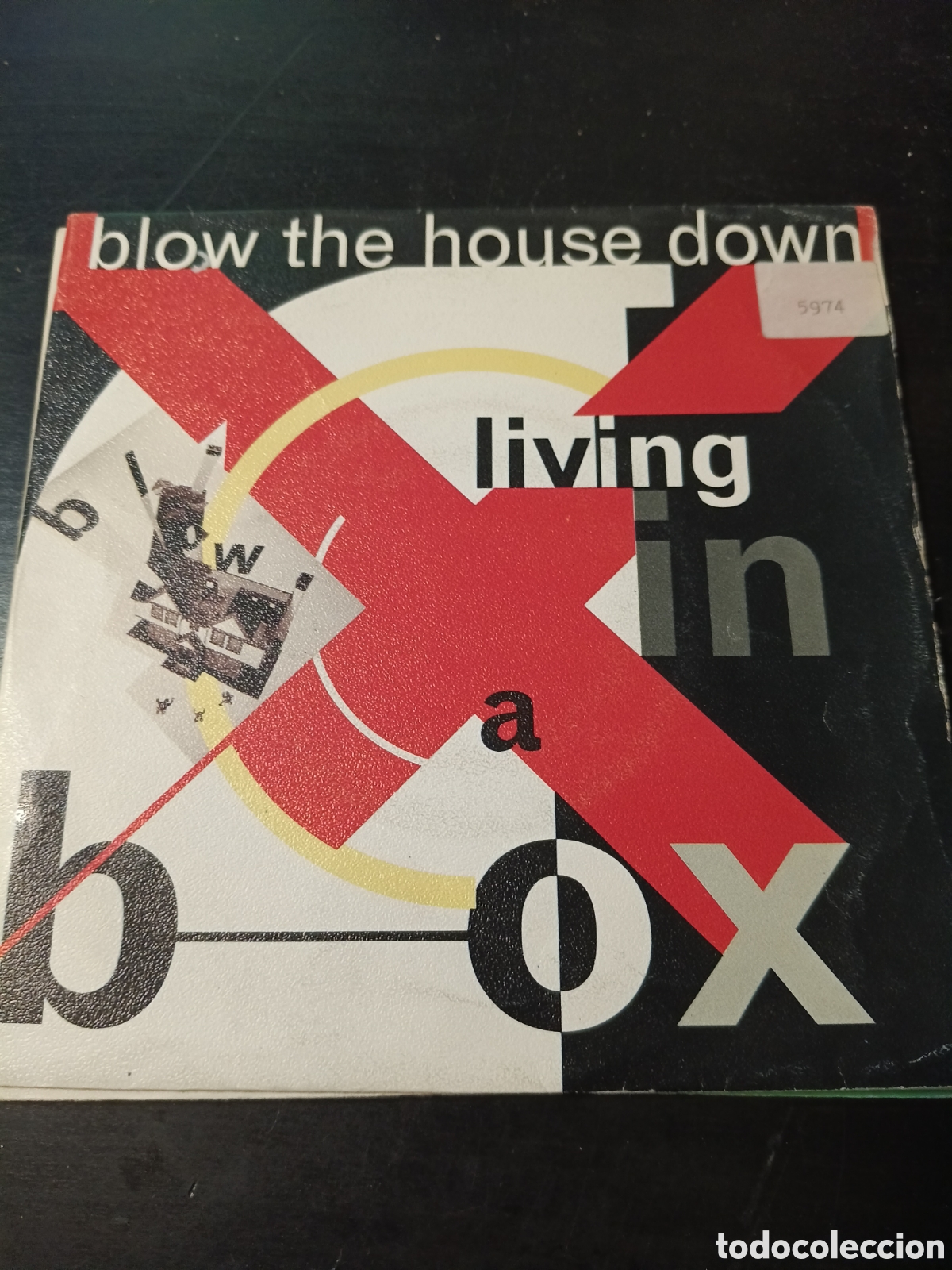 Discos de vinilo: Living In A Box &ndash; Blow The House Down. Vinilo 7&rdquo; single 1989 Espa&ntilde;a