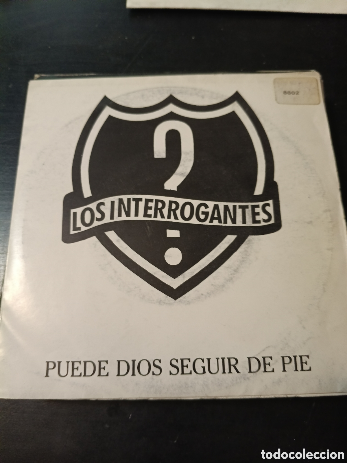 Discos de vinilo: Los Interrogantes &ndash; Puede Dios Seguir De Pie. Vinilo 7&rdquo; single promo 1991 Espa&ntilde;a
