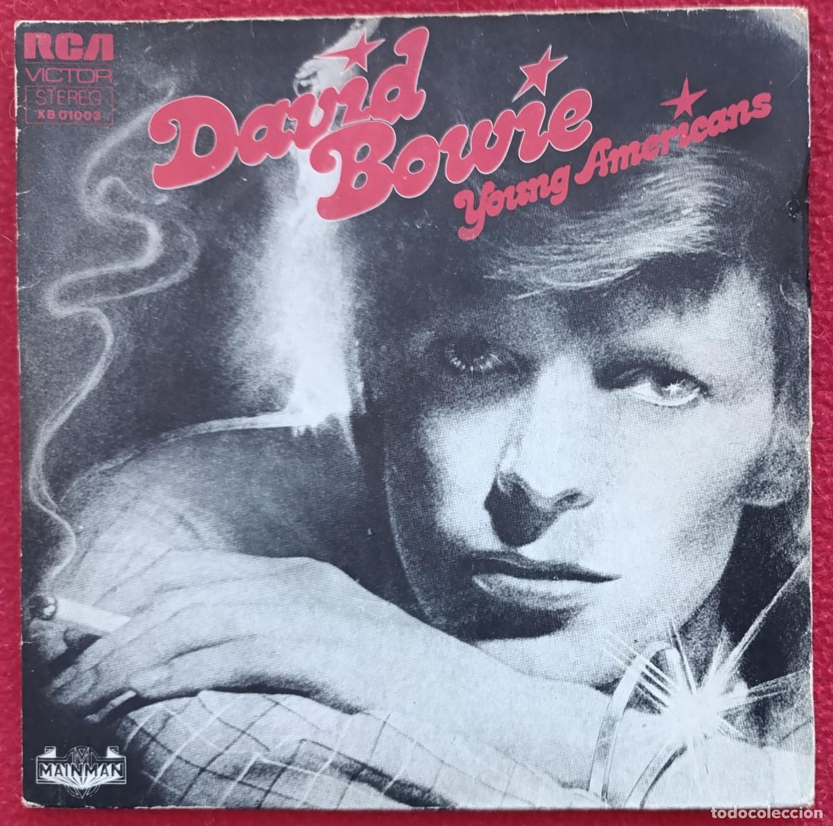 Discos de vinilo: DAVID BOWIE &lrm;&ndash; YOUNG AMERICANS 7&rdquo; 1975 EDICION FRANCESA CON SUFFRAGETTE CITY EN CARA B