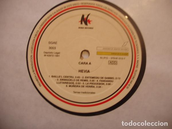 Discos de vinilo: HEVIA - HEVIA - LP - Discos La Metralleta - Foto 3