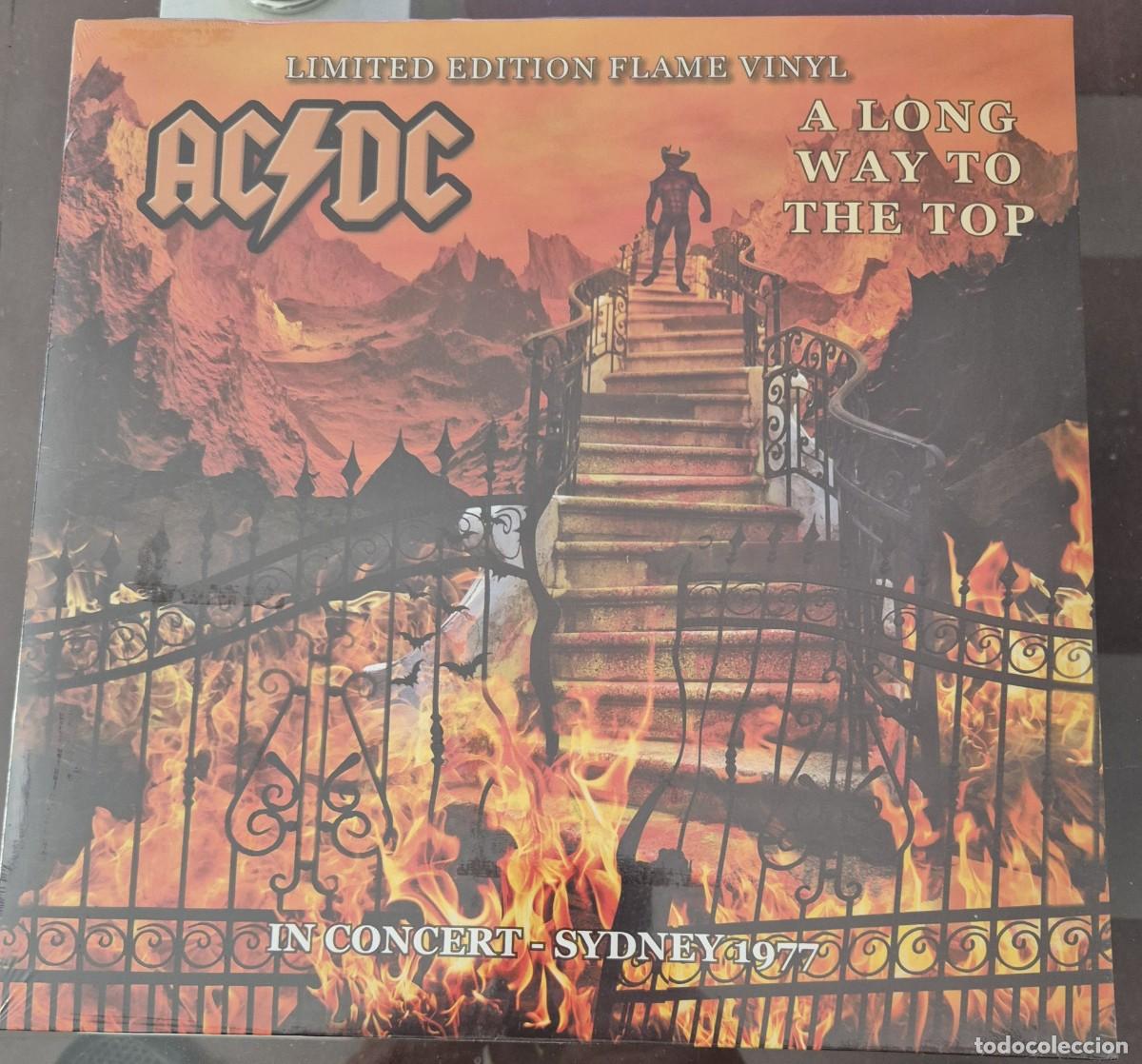 Discos de vinilo: AC/DC - A LONG WAY TO THE TOP - SIDNEY 1977. EDICION MUY LIMITADA EN VINILO COLOR NARANJA FLAMA.