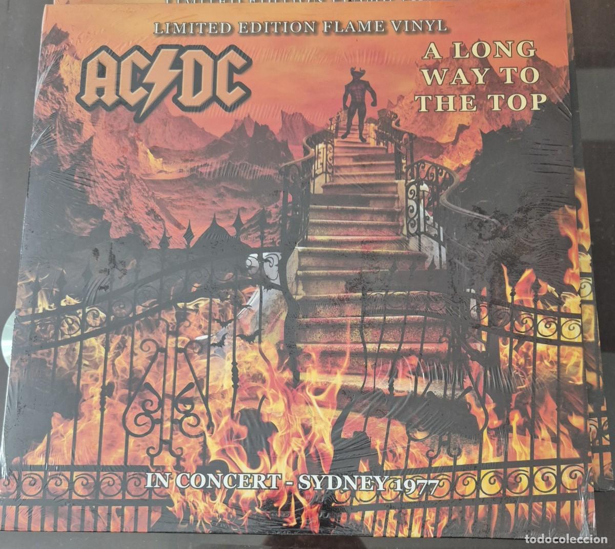 Discos de vinilo: AC/DC - A LONG WAY TO THE TOP - SIDNEY 1977. EDICION MUY LIMITADA EN VINILO COLOR NARANJA FLAMA.