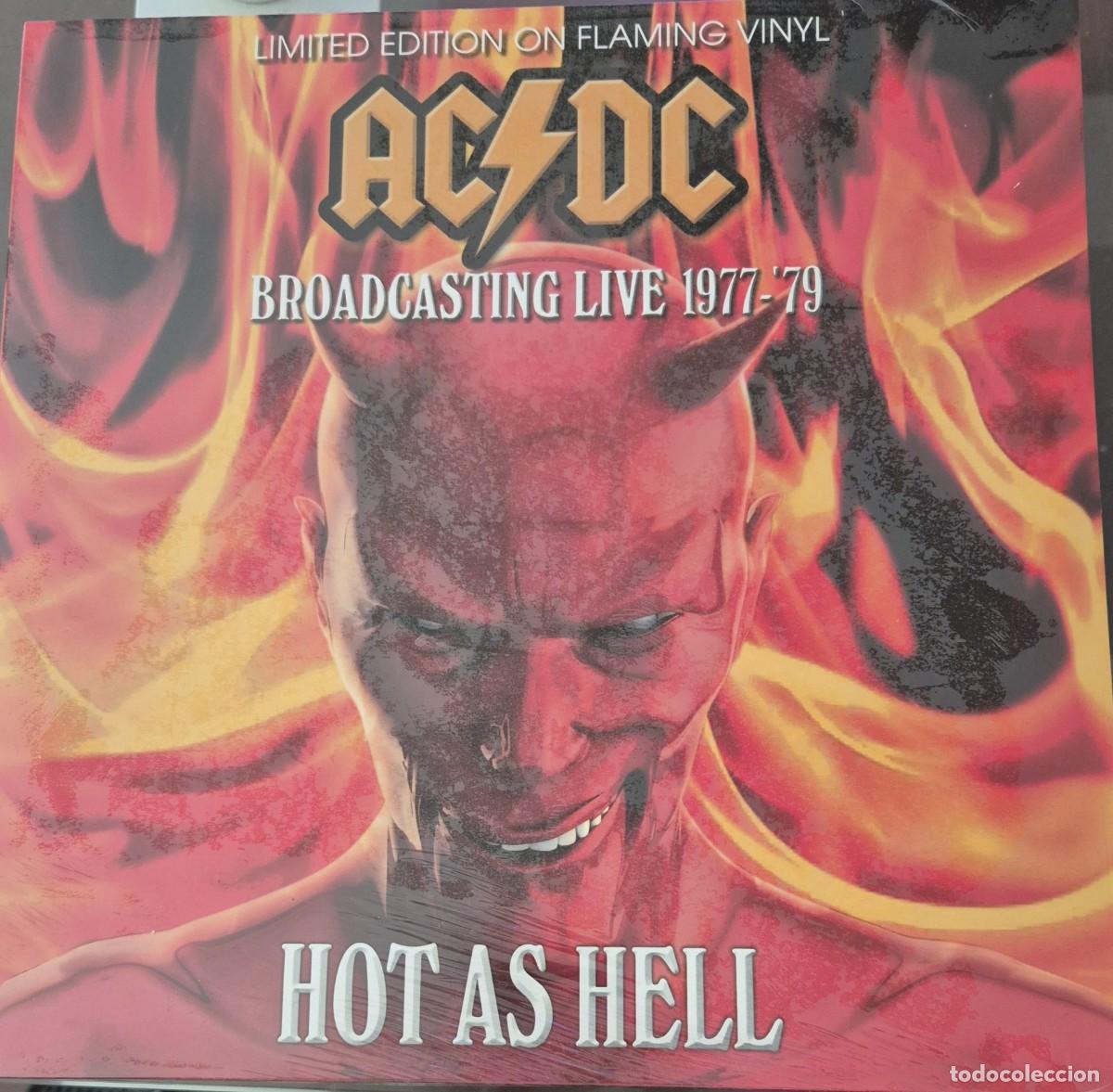 Discos de vinilo: AC/DC - HOT AS HELL - BROADCASTING LIVE 1977 - 1979. EDICION LIMITADA VINILO NARANJA Y TRAZAS NEGRAS