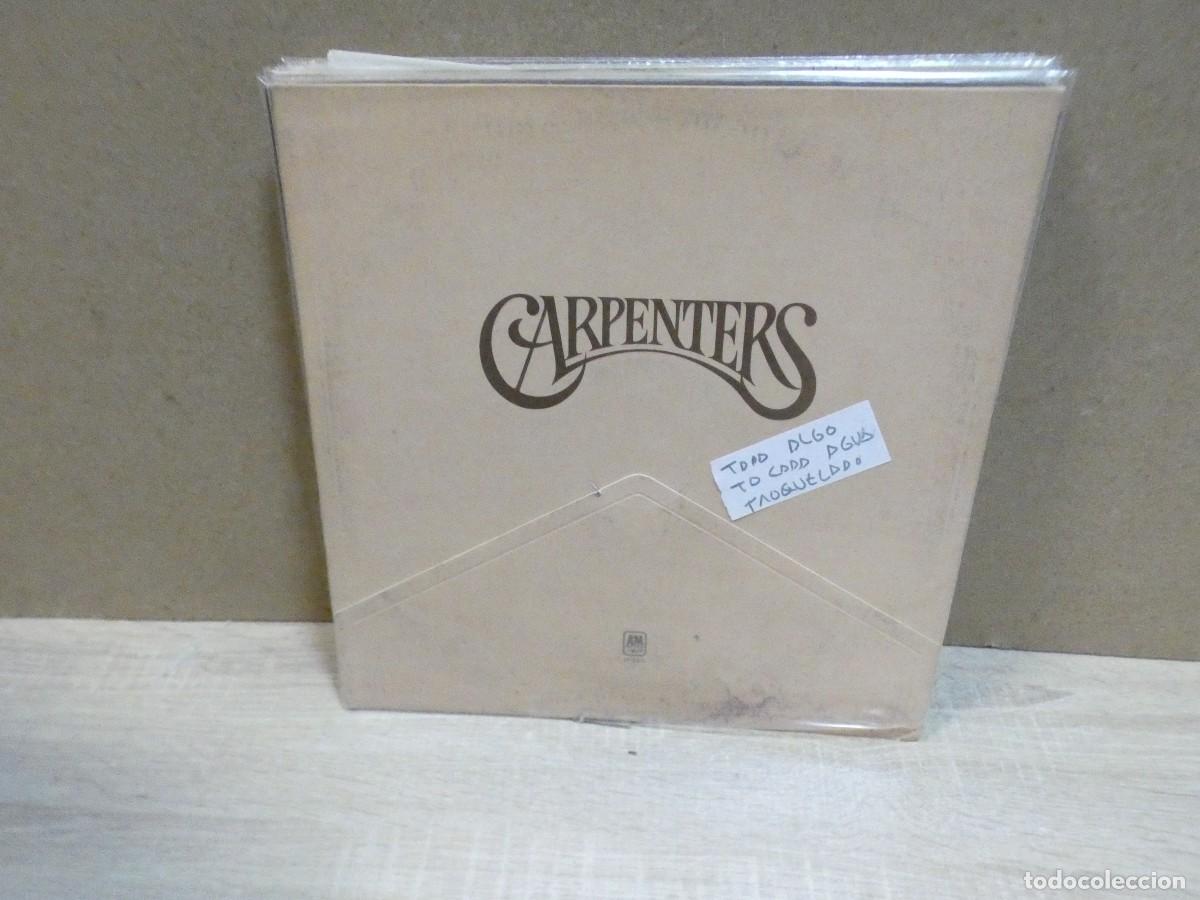 Discos de vinilo: ARKANSAS1980 CAJJ824 VINILO ESTADO LEVE USO AUN CORRECTO CARPENTERS TAPA ALGO TOCADA AGUA TROQUELADO