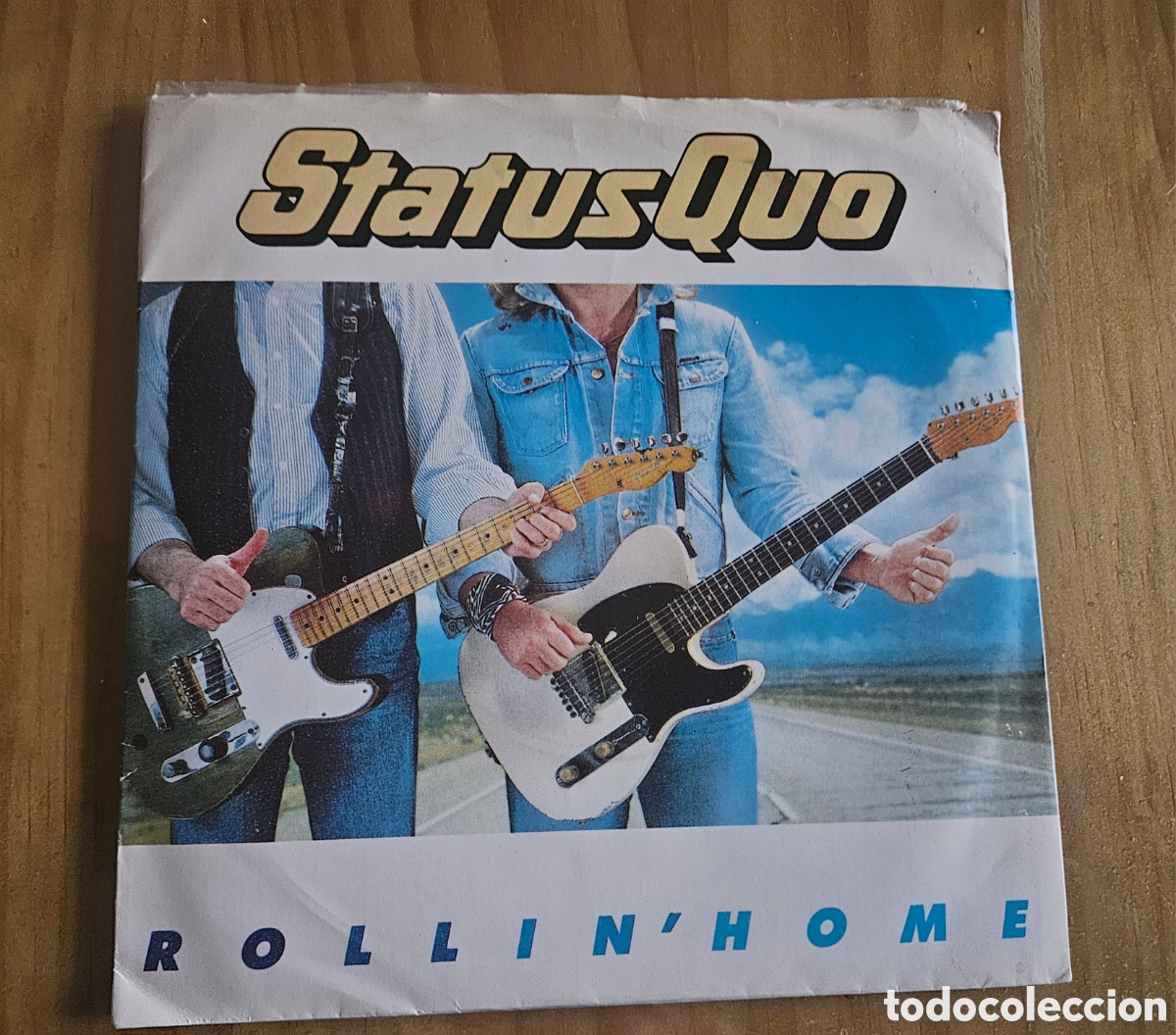 Discos de vinil: Single Status Quo Rollin' Home 1986