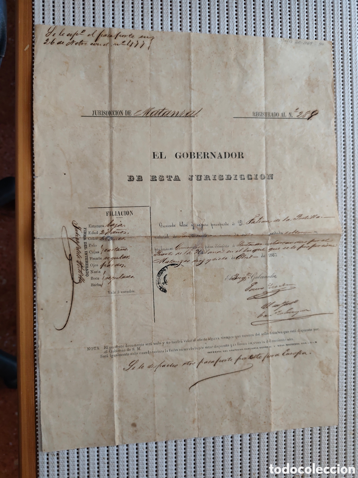 Documentos antiguos: 26-1069 CONCEDO PASAPORTE A D.JUAN PARA VIAJAR A E.UNIDOS.