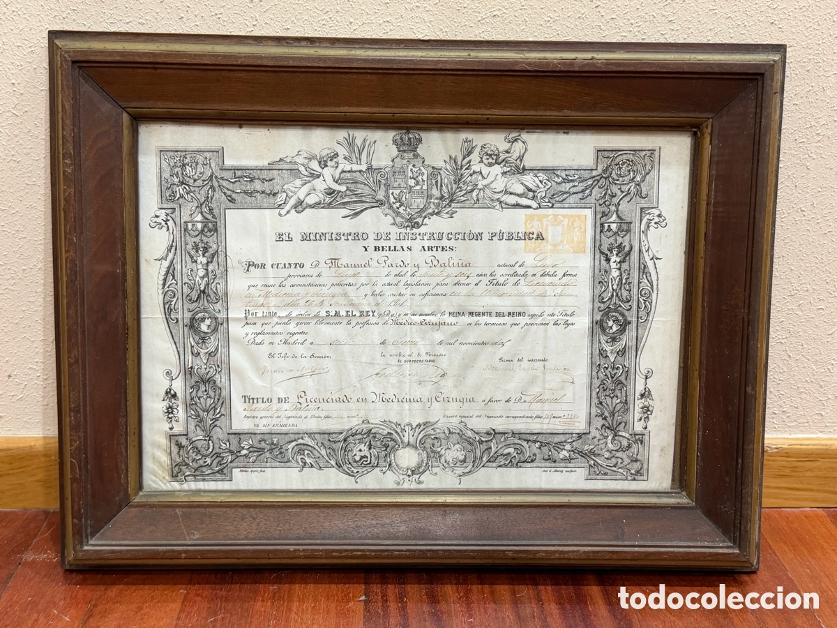 Documentos antiguos: T&iacute;tulo original antiguo de Medicina y Cirug&iacute;a (1902) enmarcado