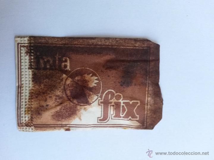 Escrita: Tinta antigua en polvo,fix color sepia sobre con polvo de 6 x 4 cms