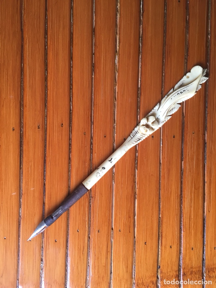 Escriban&iacute;a: Pluma de hueso tallada. - Foto 1