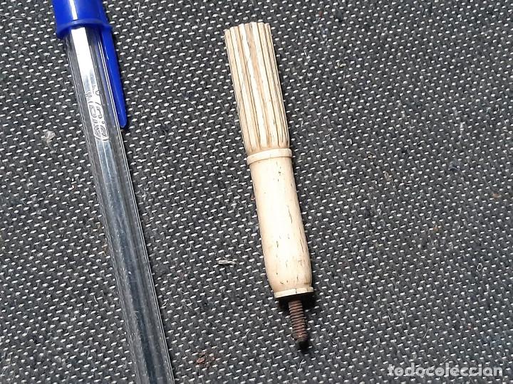 Escriban&iacute;a: Pieza en hueso incompleta. - Foto 1