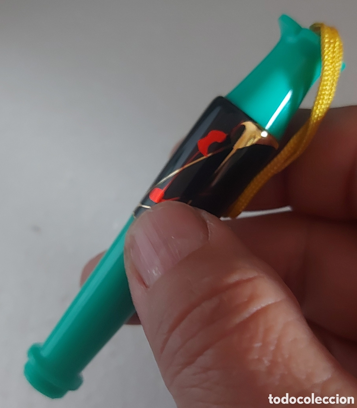 Escriban&iacute;a: Peque&ntilde;a pluma con carga en perilla a&ntilde;os 80