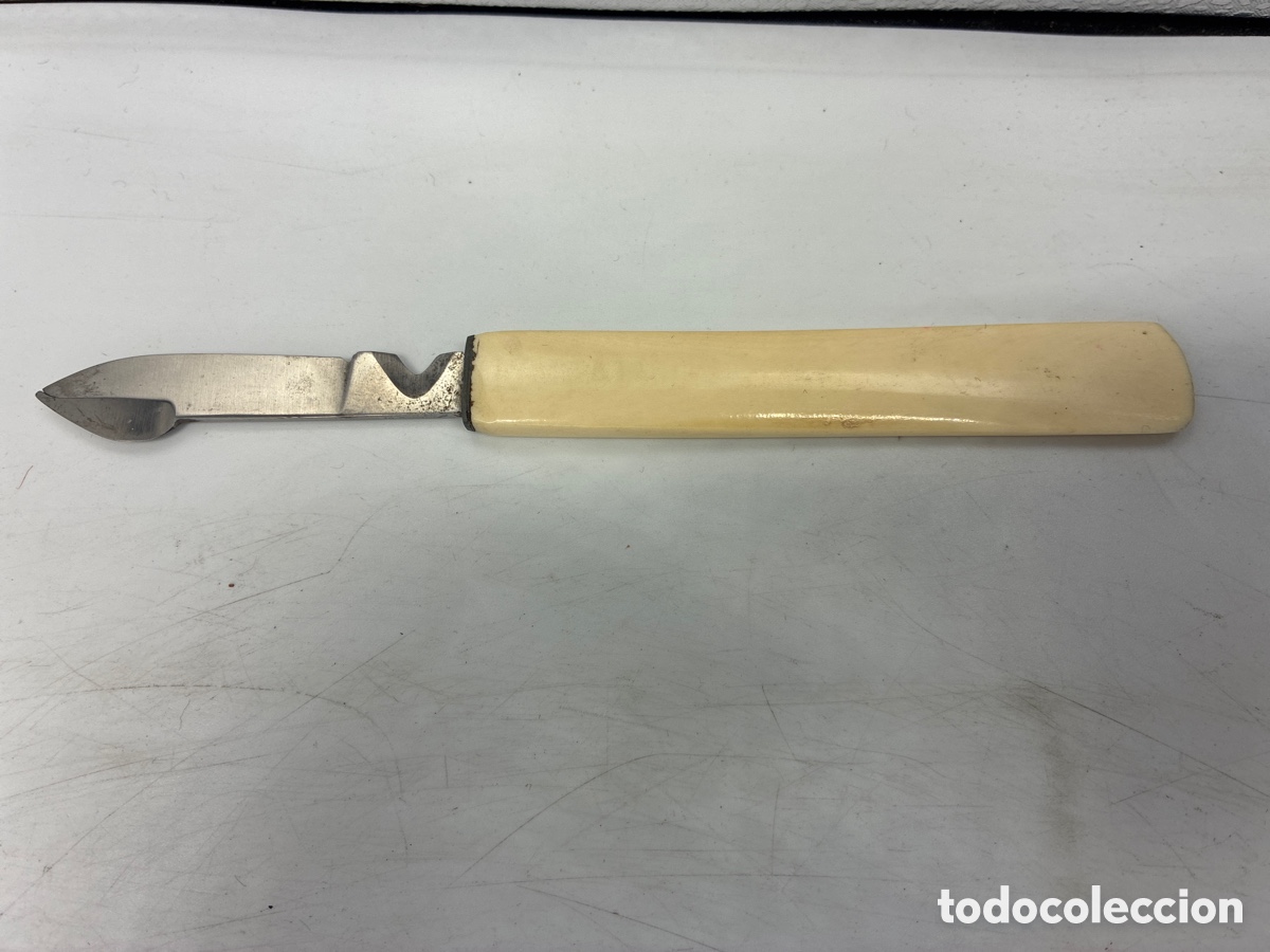 Escriban&iacute;a: Rascador Corta plumas - Foto 1
