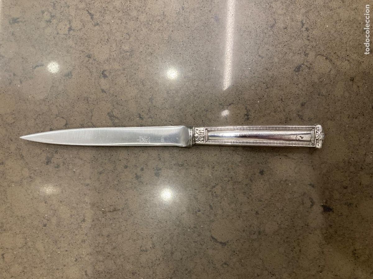 Escriban&iacute;a: Antiguo abrecartas con mango de plata y hoja de acero. Largo 21cm.