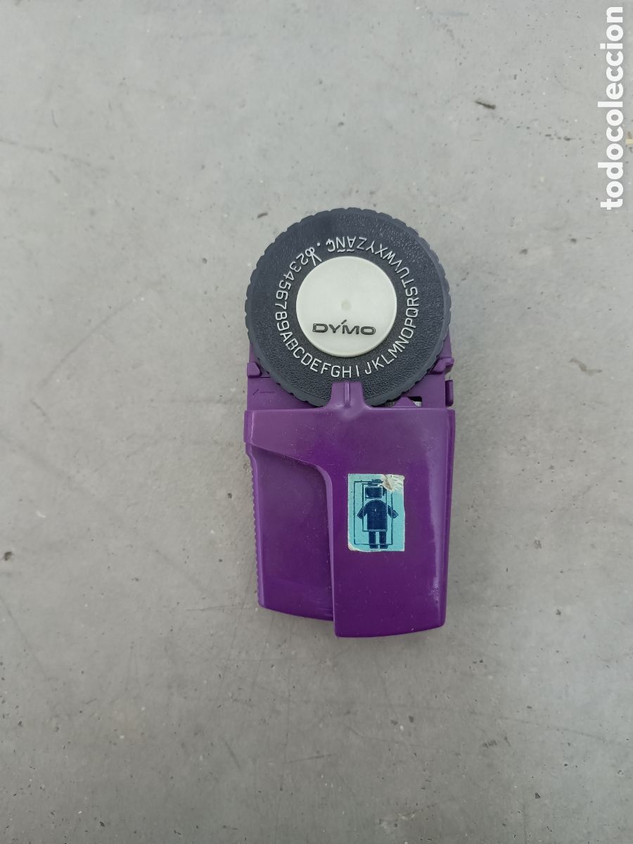 Escriban&iacute;a: M&Aacute;QUINA DE ROTULACI&Oacute;N DYMO MODELO MORADO - Foto 1