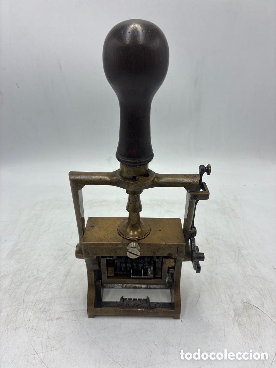 Escriban&iacute;a: Antiguo numerador de bronce. - Foto 2