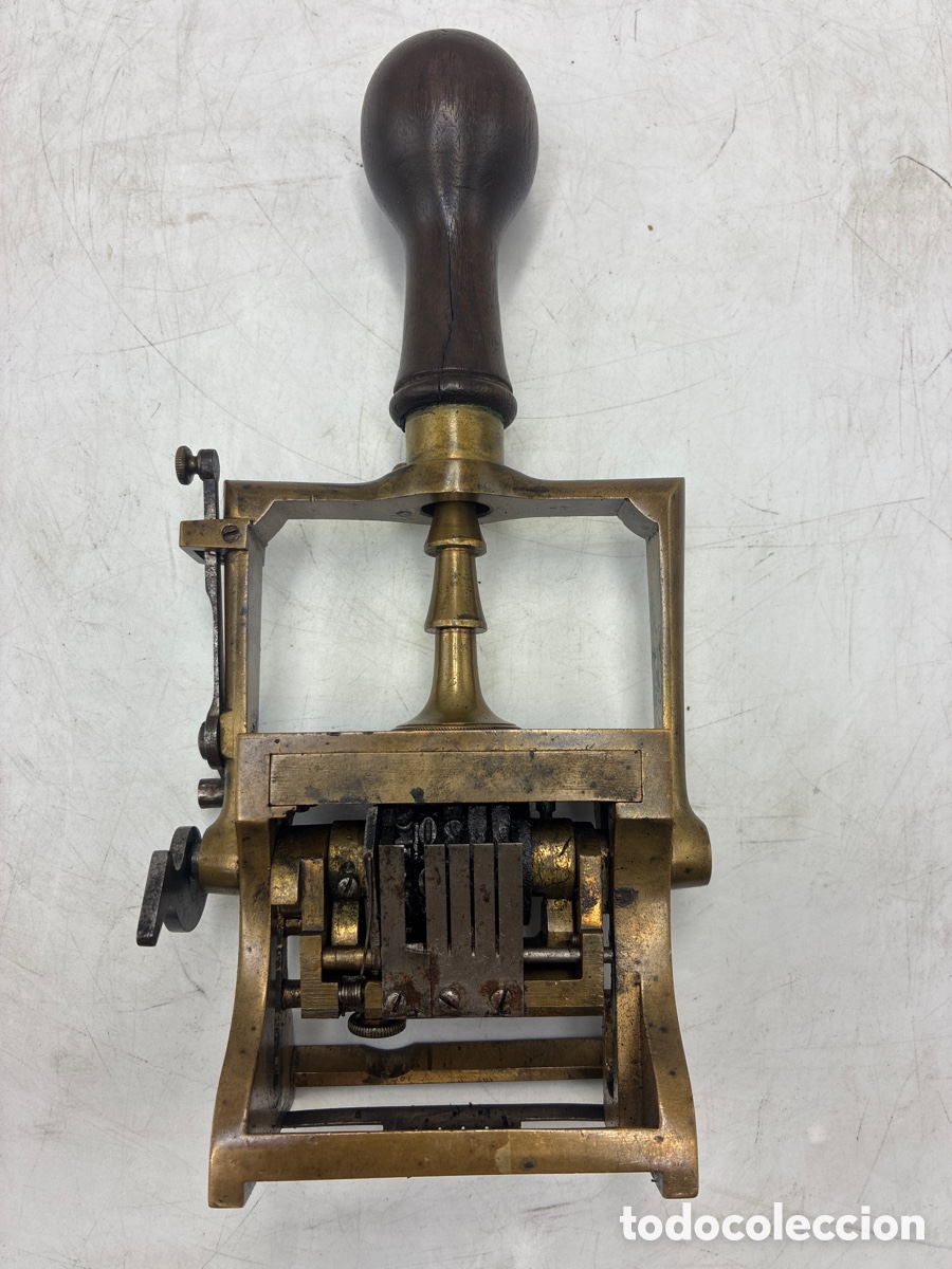 Escriban&iacute;a: Antiguo numerador de bronce. - Foto 1
