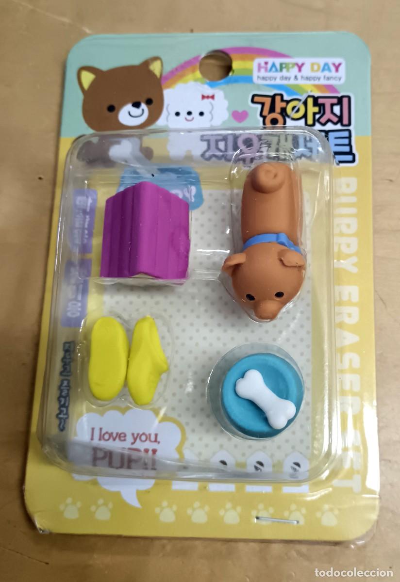 Escriban&iacute;a: BLISTER CON 4 GOMAS PERRO 12,5X8 CM.
