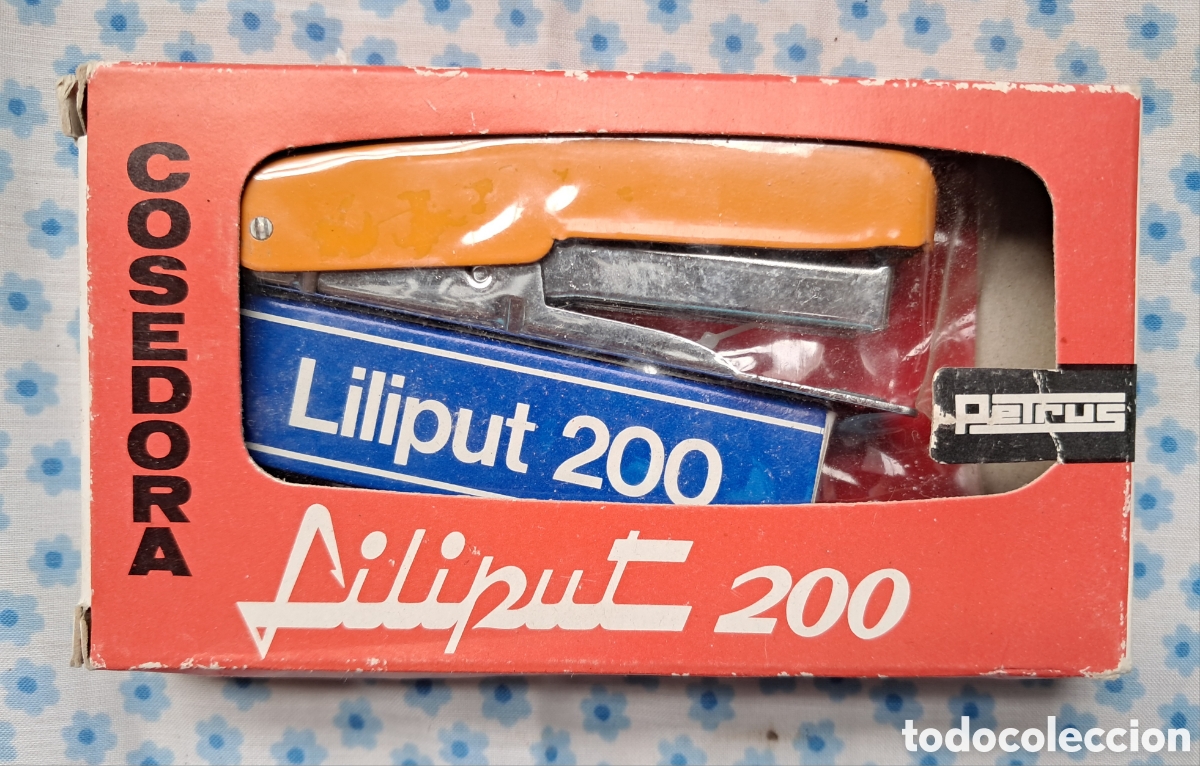 Escriban&iacute;a: Liliput 200 cosedora de Petrus naranja. Longitud base 7cm