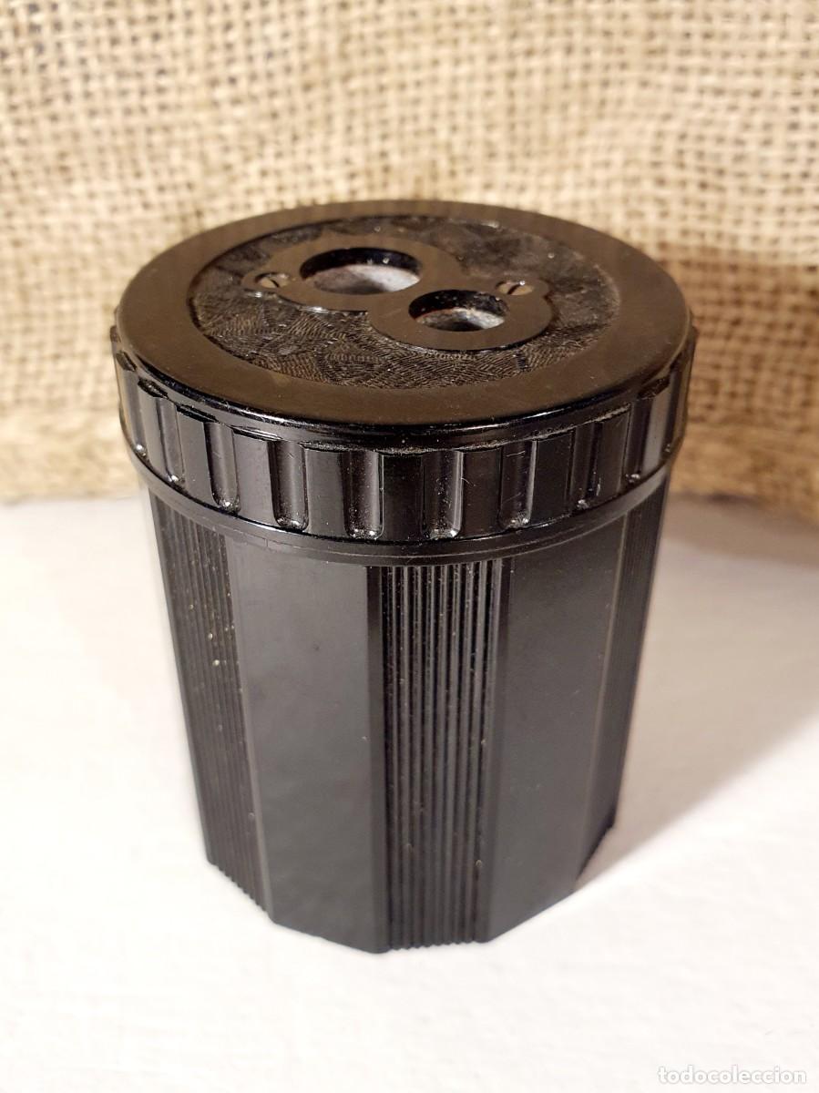 Escriban&iacute;a: Afilapuntas Dux de baquelita. 1950.