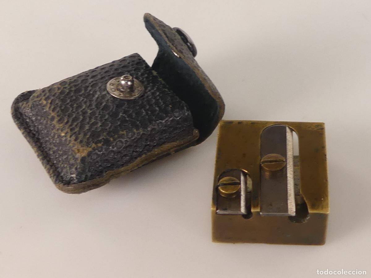 Writing Items: ANTIGUA SACAPUNTAS MARCA TITAN CON FUNDA