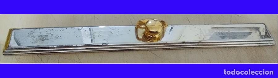 Escriban&iacute;a: PISAPAPELES DE METAL PLATEADO REGLA INSCRITO ALPHIRA MIDE 22,5/2.5 CM