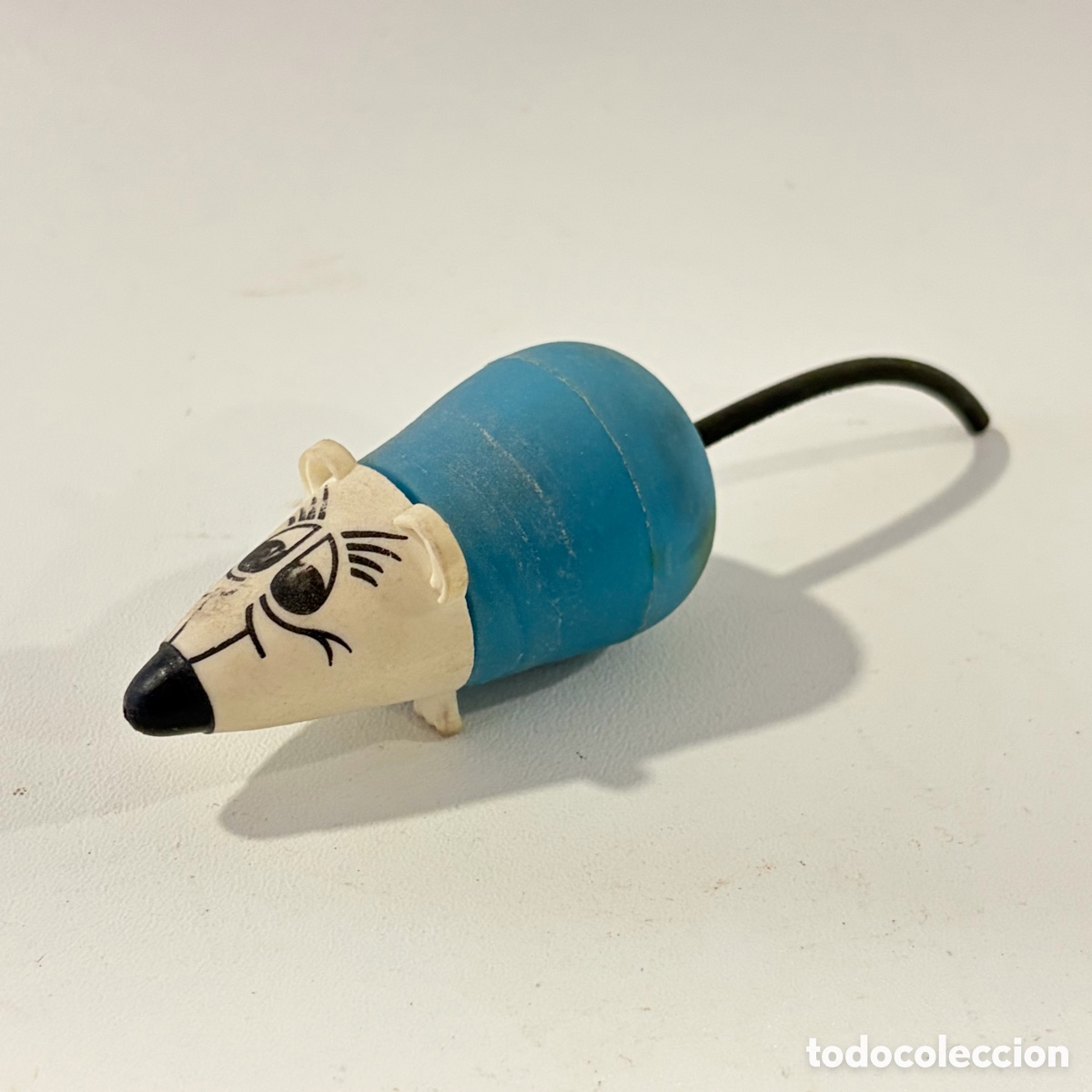 Escriban&iacute;a: goma de borrar antigua con forma de rat&oacute;n Pelikan azul y blanco con cola negra