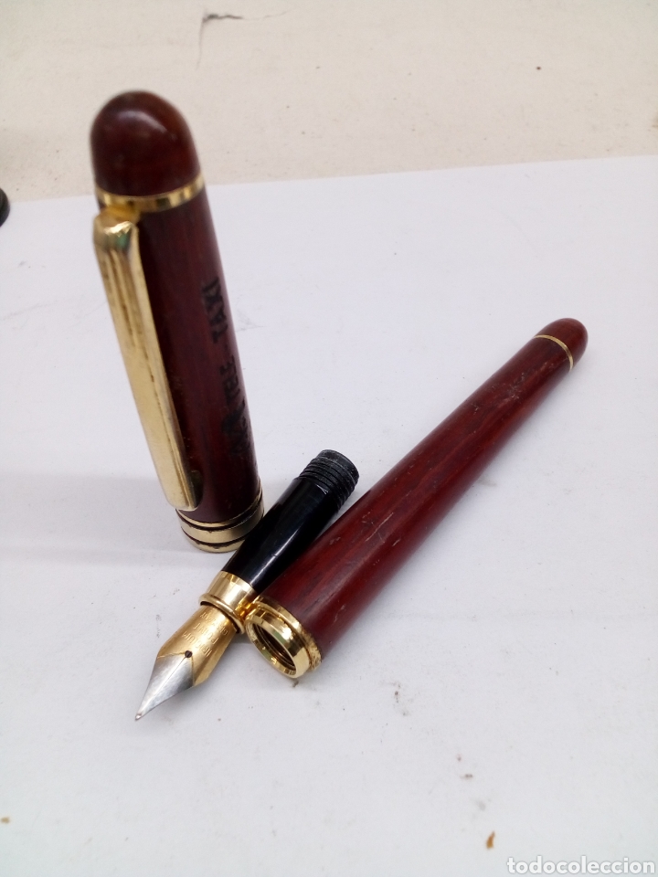 Penne stilografiche antiche: Pluma cuerpo madera publicidad tele taxi