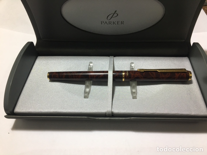 Alte F&uuml;llfederhalter: Pluma Parker marmolada marr&oacute;n con adaptador de tinta en su caja como nueva