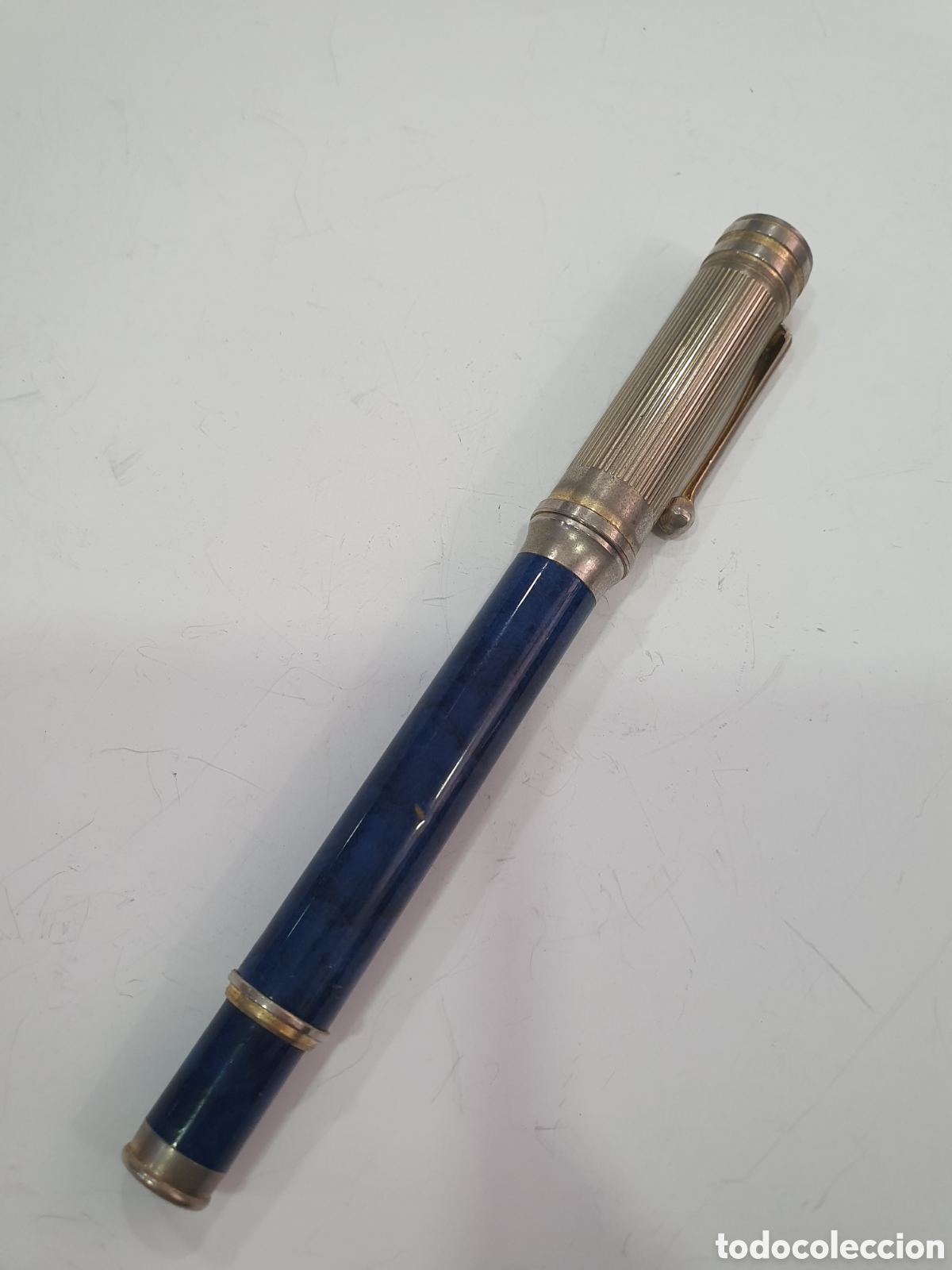 Plumas de tinta permanente antigas: Pluma estilografica azul y plateada. (L128)