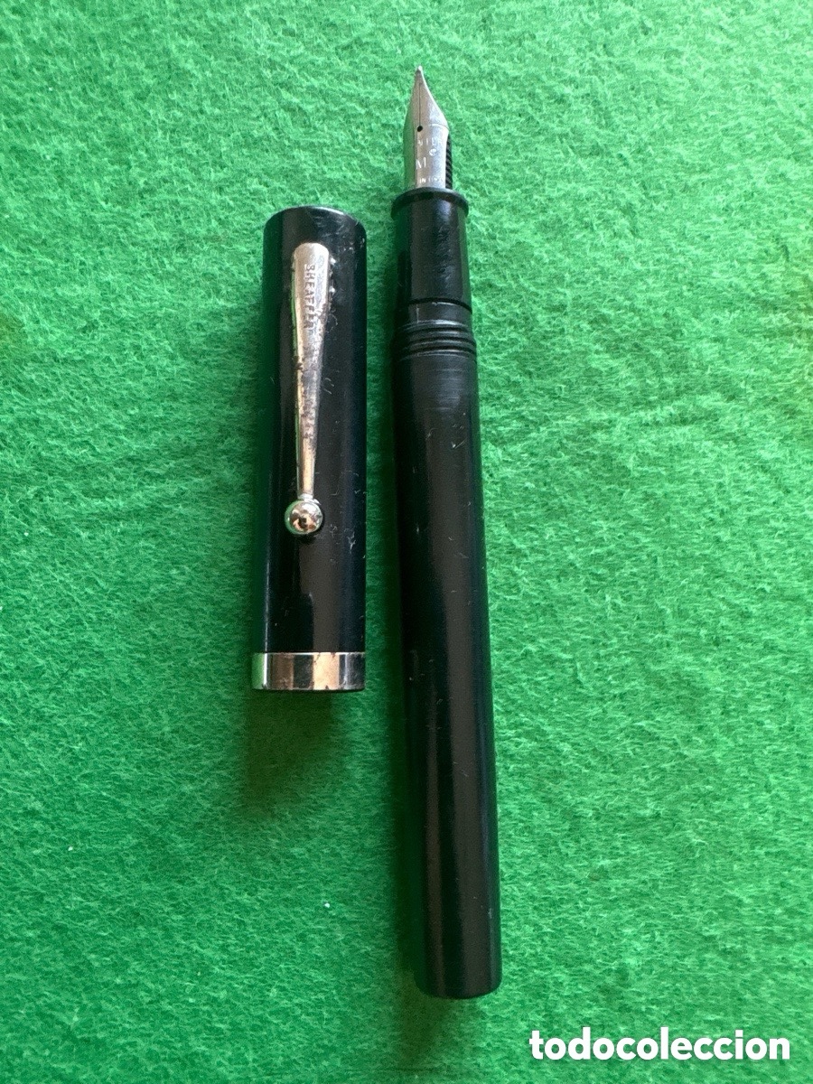 Plumas estilogr&aacute;ficas antiguas: Pluma Sheaffer No Nonsense rojo transl&uacute;cido (A5)