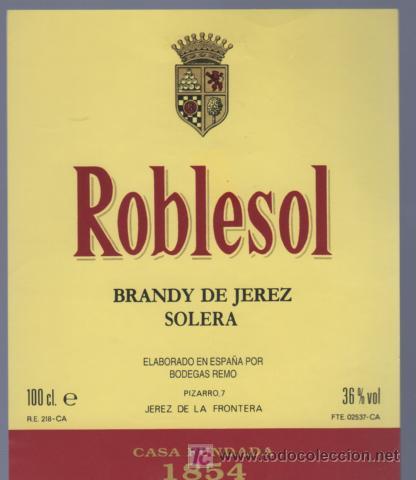Etichette antiche: ETIQUETA DE BRANDY. ROBLESOL. BODEGAS REMO. JEREZ. CADIZ.