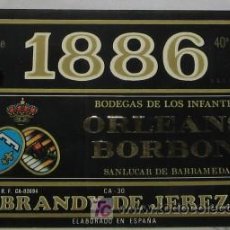 Etiquetas antiguas: ETIQUETA DE BRANDY 1886, BODEGAS ORLEANS BORBON, SANLÚCAR