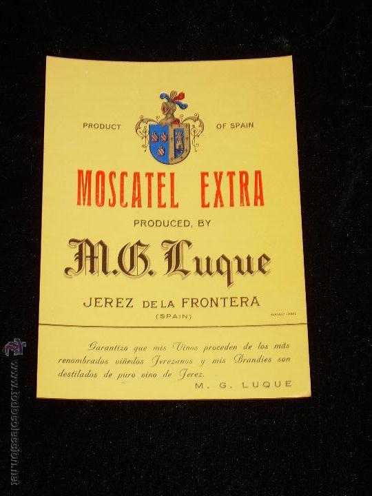 Etiquetas antiguas: ANTIGUA ETIQUETA DE MOSCATEL EXTRA DE BODEGAS M.G. LUQUE